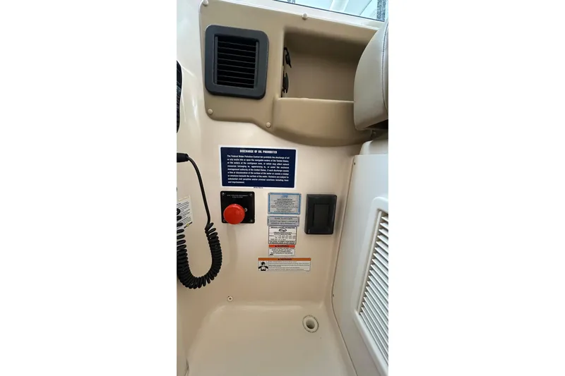  Yacht Photos Pics 2013 Grady-White Freedom 335 boat interior control panel with safety instructions.