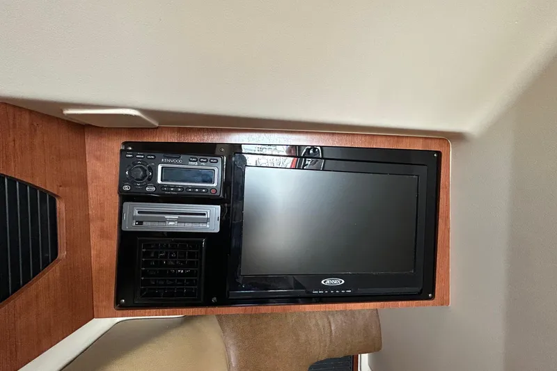  Yacht Photos Pics 2013 Grady-White Freedom 335 interior with Kenwood stereo and Jensen TV.