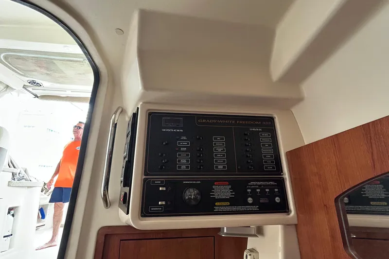  Yacht Photos Pics Control panel of 2013 Grady-White Freedom 335 boat interior.