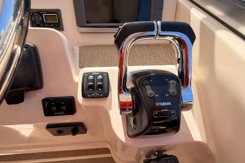  Yacht Photos Pics 2013 Grady-White Freedom 335 boat controls with Yamaha throttle and Kenwood audio system.