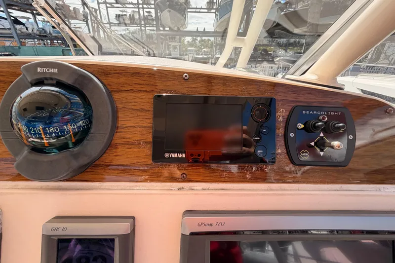  Yacht Photos Pics Dashboard of 2013 Grady-White Freedom 335 boat with compass and navigation controls.