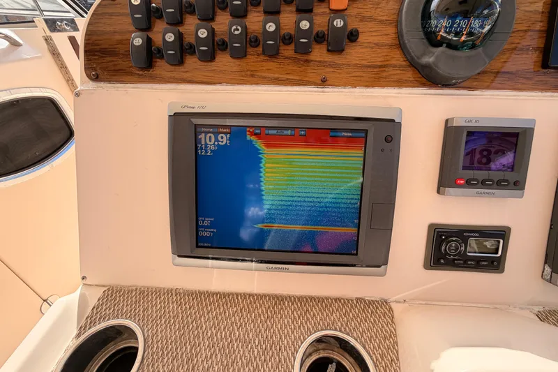  Yacht Photos Pics 2013 Grady-White Freedom 335 dashboard with Garmin navigation and control systems.
