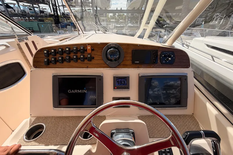  Yacht Photos Pics Grady-White Freedom 335 2013 boat dashboard with Garmin navigation system.