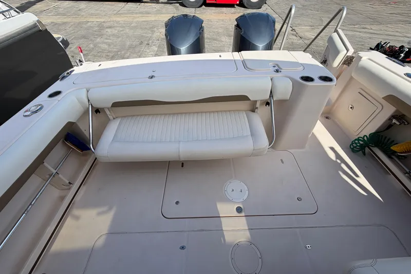  Yacht Photos Pics 2013 Grady-White Freedom 335 boat deck with seating and storage compartments.