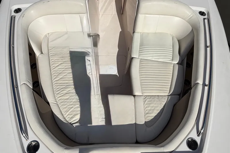  Yacht Photos Pics 2013 Grady-White Freedom 335 boat interior with white cushioned seating.