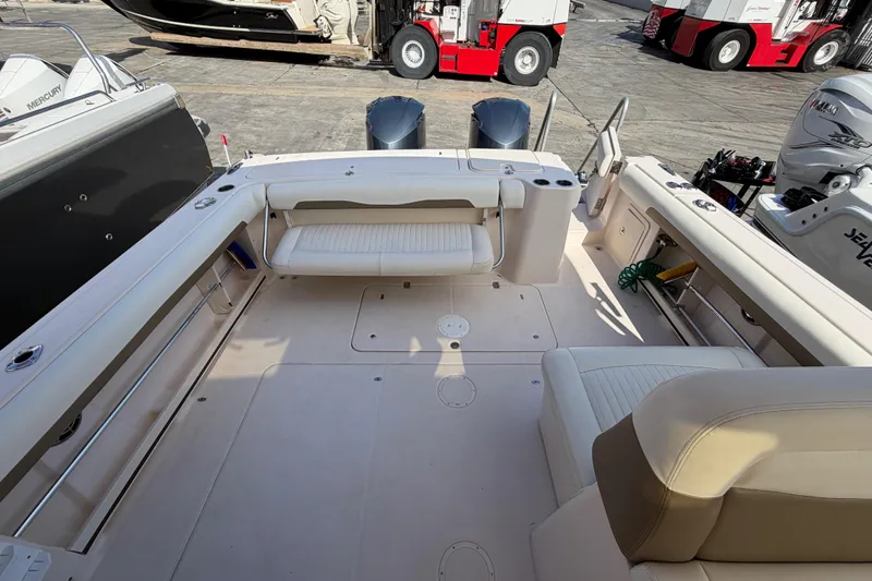  Yacht Photos Pics 2013 Grady-White Freedom 335 boat interior with seating and storage compartments.