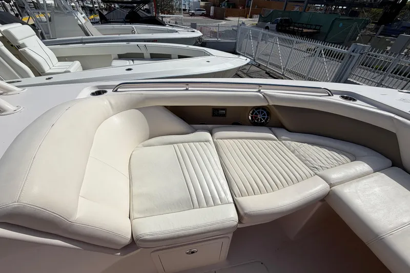  Yacht Photos Pics 2013 Grady-White Freedom 335 boat with luxurious white seating and speaker system.