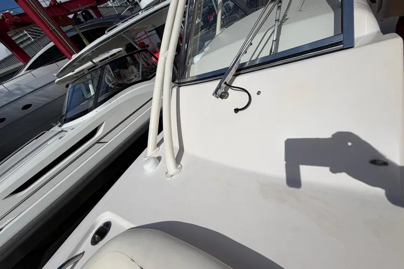  Yacht Photos Pics 2013 Grady-White Freedom 335 boat docked, showcasing deck and windshield details.