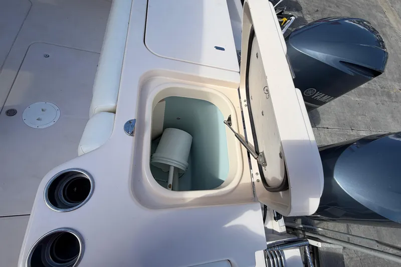 Yacht Photos Pics 2013 Grady-White Freedom 335 boat with open storage compartment and Yamaha engines.