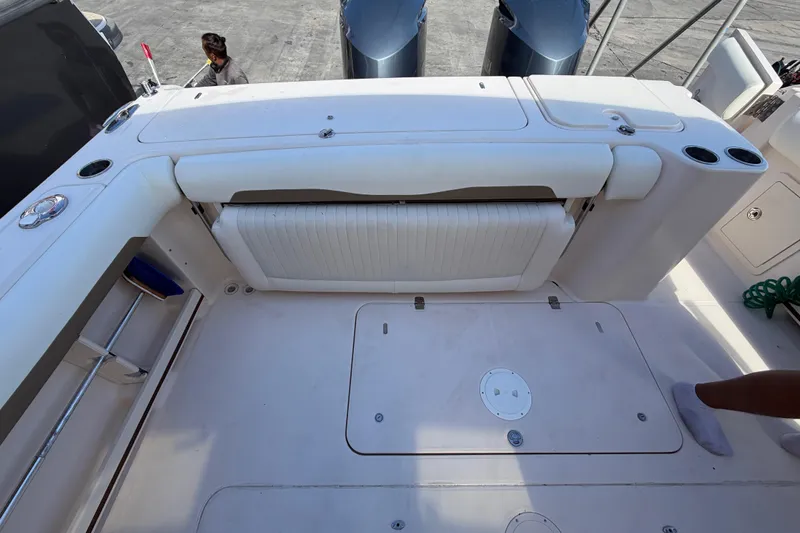  Yacht Photos Pics 2013 Grady-White Freedom 335 boat deck with seating and storage compartments.