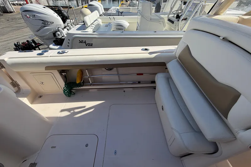  Yacht Photos Pics 2013 Grady-White Freedom 335 boat interior with seating and Yamaha outboard engines.