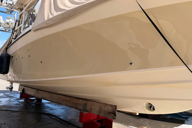  Yacht Photos Pics 2013 Grady-White Freedom 335 boat on dry dock, side view.