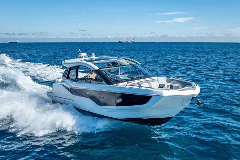  Yacht Photos Pics 2023 Galeon 375 GTO luxury yacht cruising on open blue sea.