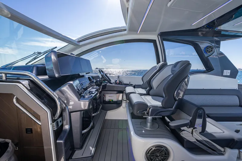  Yacht Photos Pics Interior of 2023 Galeon 375 GTO yacht with modern helm and seating.
