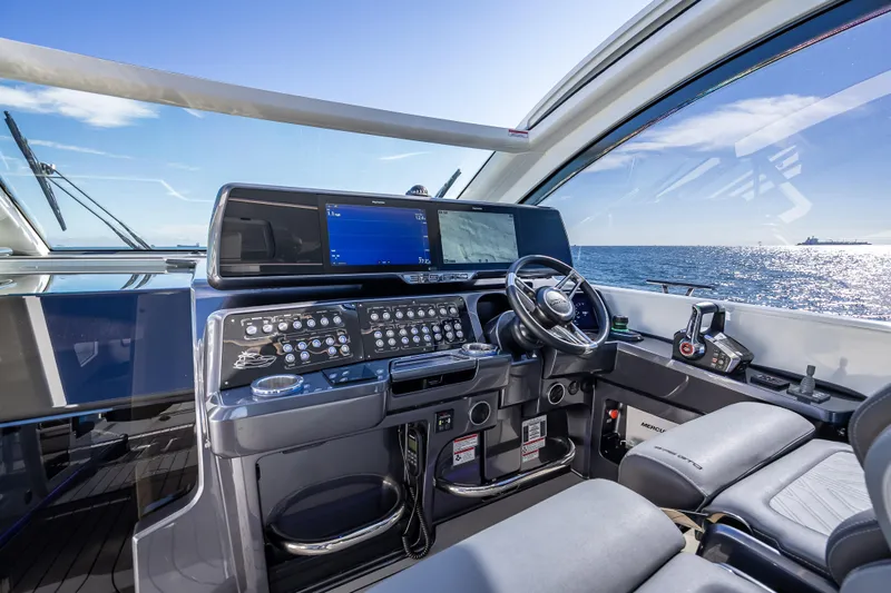  Yacht Photos Pics 2023 Galeon 375 GTO yacht cockpit with advanced navigation system and ocean view.