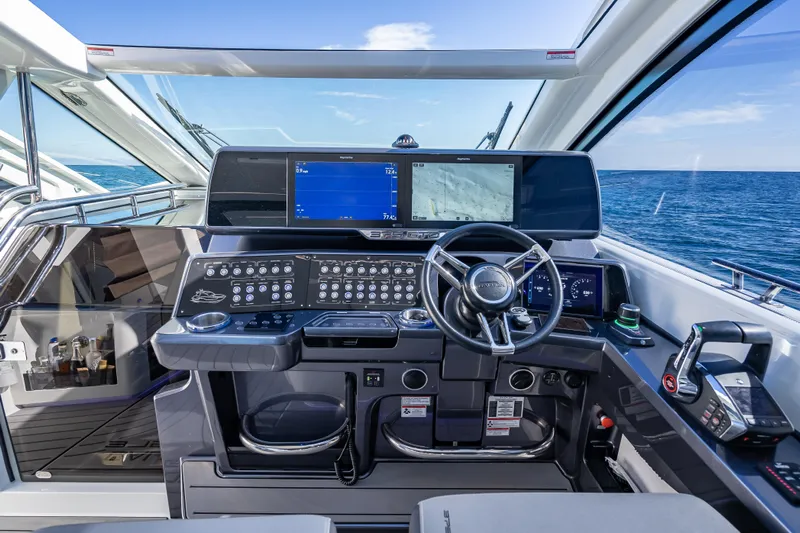  Yacht Photos Pics Cockpit of 2023 Galeon 375 GTO yacht with advanced navigation systems and ocean view.