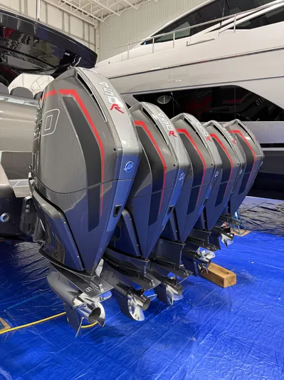 Incognito Yacht Photos Pics 2022 Cigarette 42 Nighteagle with multiple outboard engines in a showroom.