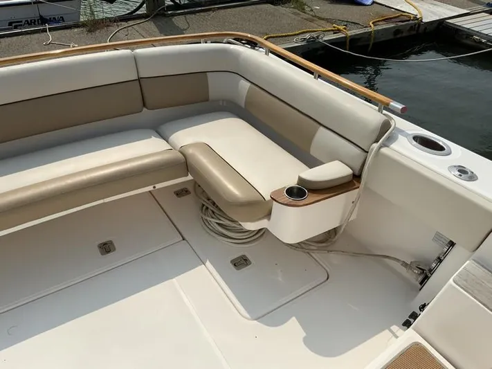 Intuition Yacht Photos Pics Tiara Yachts 36, 2013 model, featuring spacious seating and cup holders on deck.