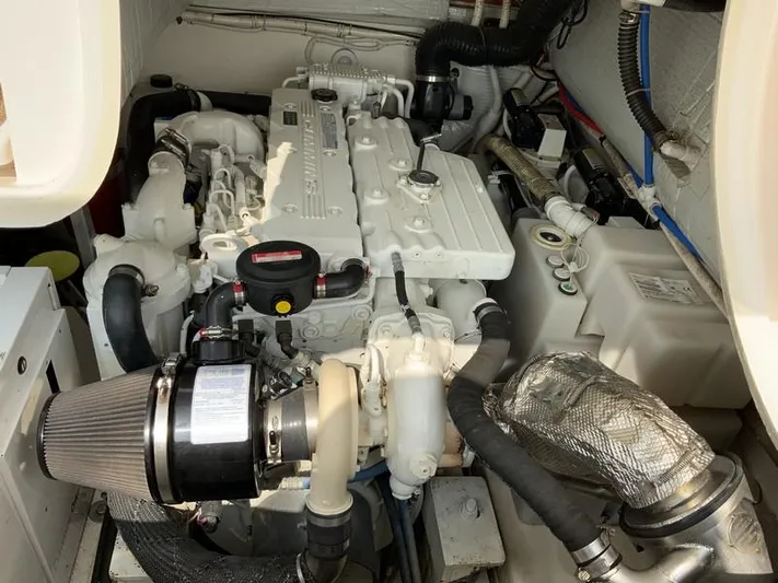 Intuition Yacht Photos Pics Engine compartment of a 2013 Tiara Yachts 36, showcasing detailed mechanical components.