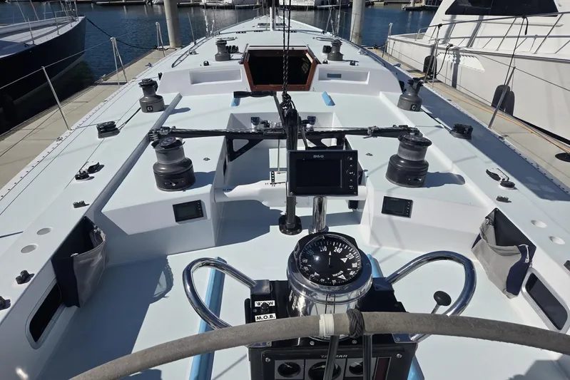 Grand Illusion Yacht Photos Pics Cockpit view of a 1986 Santa Cruz 70 sailboat, featuring navigation instruments and winches.