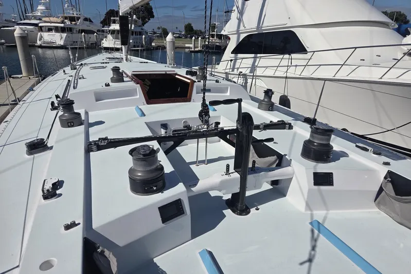 Grand Illusion Yacht Photos Pics Sailboat deck of 1986 Santa Cruz 70, docked at marina with winches and rigging.