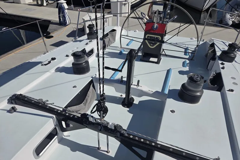 Grand Illusion Yacht Photos Pics Deck view of 1986 Santa Cruz 70 sailboat with winches and steering wheel.