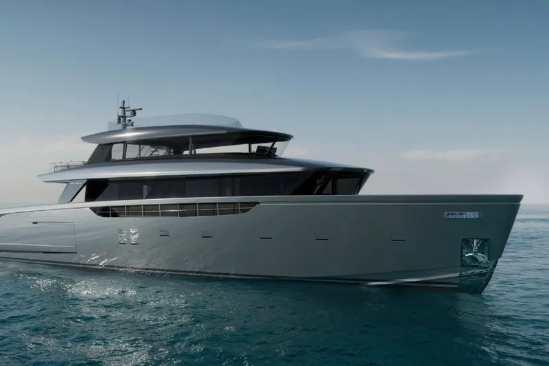  Yacht Photos Pics Luxurious 2027 Sanlorenzo SX120 yacht cruising on open sea under clear skies.