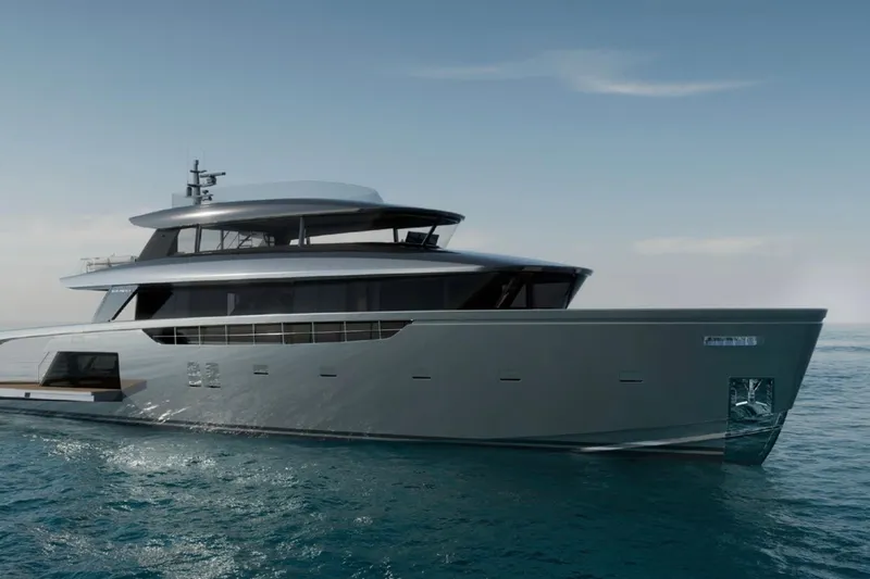  Yacht Photos Pics Luxurious 2027 Sanlorenzo SX120 yacht cruising on open sea under clear skies.