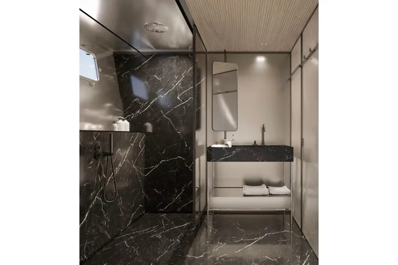  Yacht Photos Pics Luxurious bathroom in 2027 Sanlorenzo SX120 yacht with sleek black marble design.