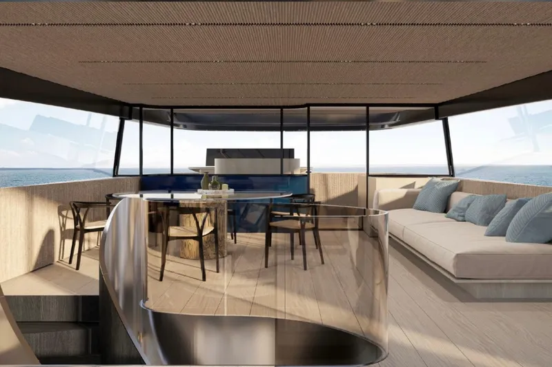  Yacht Photos Pics Luxurious interior of 2027 Sanlorenzo SX120 yacht with modern seating and ocean view.