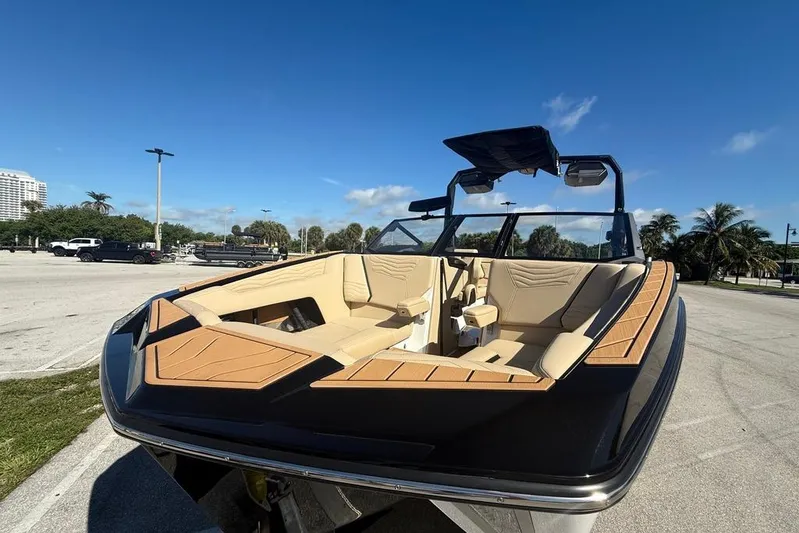  Yacht Photos Pics 2026 Nautique Super Air Nautique G25 Coastal Edition boat with luxurious seating and sleek design.