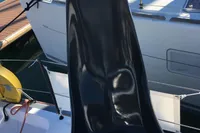 2018 Outremer 4X yacht seat, sleek black design, docked at marina.