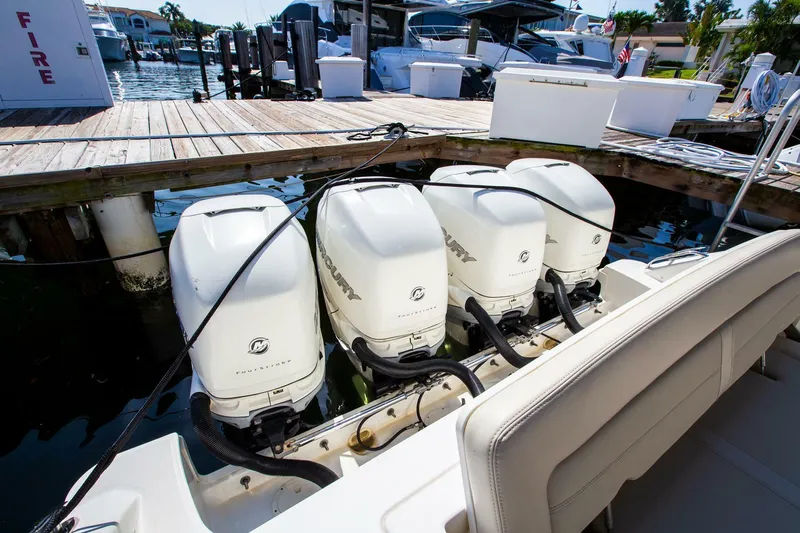  Yacht Photos Pics Four Mercury outboard engines on a 2019 Boston Whaler 380 Realm at a dock.