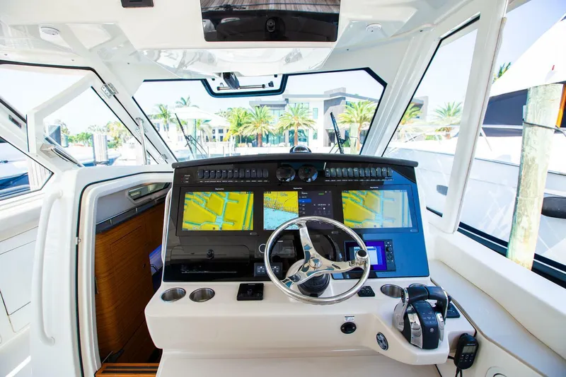  Yacht Photos Pics 2019 Boston Whaler 380 Realm helm with advanced navigation displays and controls.