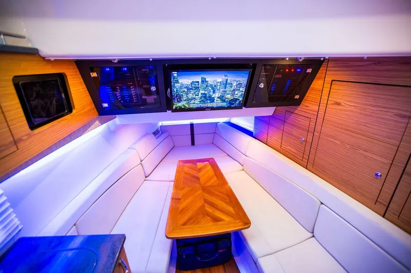  Yacht Photos Pics Luxurious interior of 2019 Boston Whaler 380 Realm with modern seating and entertainment system.