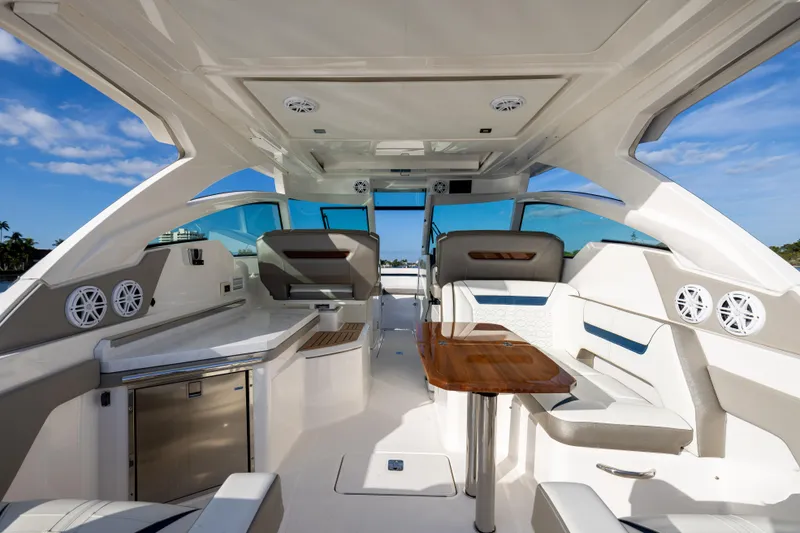 34 Tiara 2022 Yacht Photos Pics Interior of 2022 Tiara 34 LX yacht with modern seating and sleek design.
