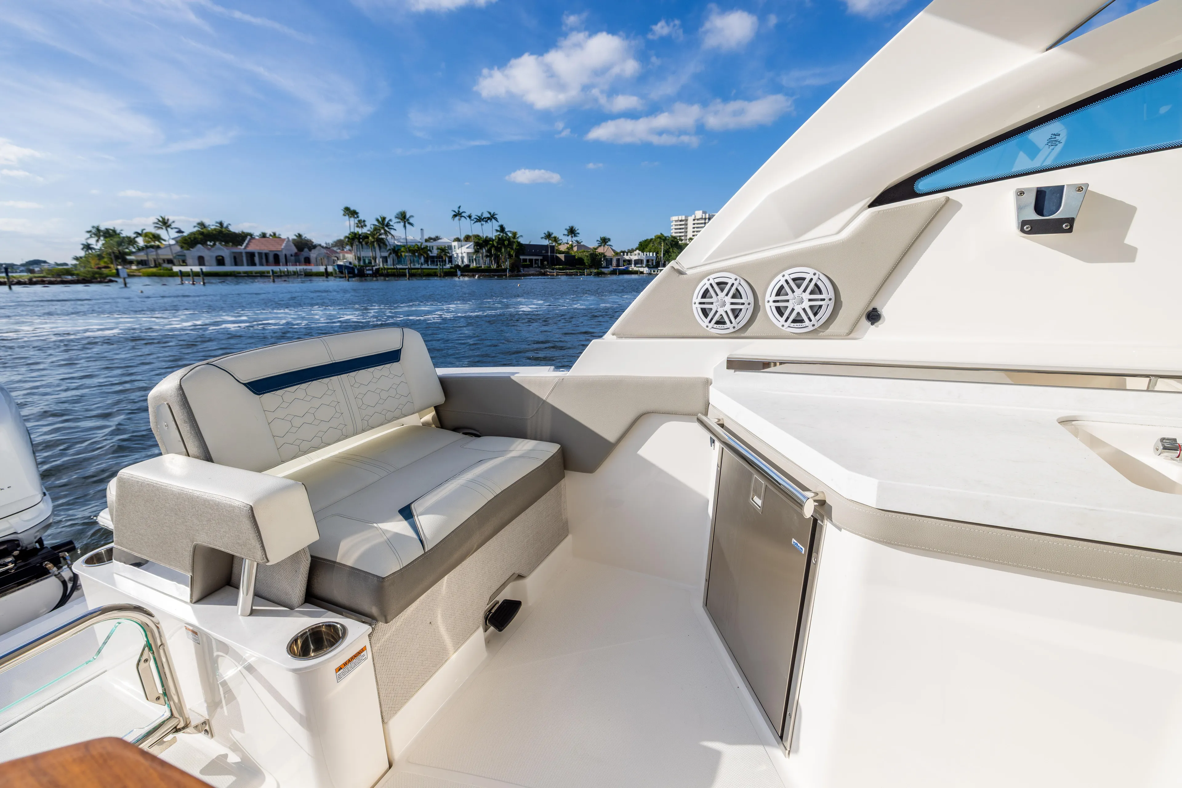 34 Tiara 2022 Yacht Photos Pics Luxurious 2022 Tiara 34 LX boat interior with seating and ocean view.