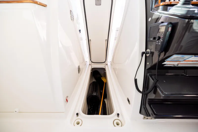 34 Tiara 2022 Yacht Photos Pics 2022 Tiara 34 LX boat storage compartment with equipment and accessories.