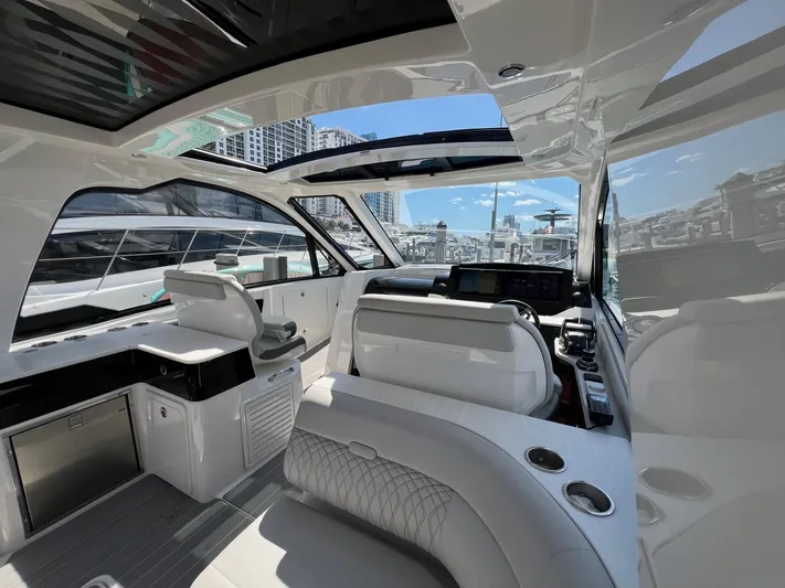 Donna Jane Yacht Photos Pics Interior of 2023 Sea Ray Sundancer 370 OB luxury yacht with modern helm and seating.