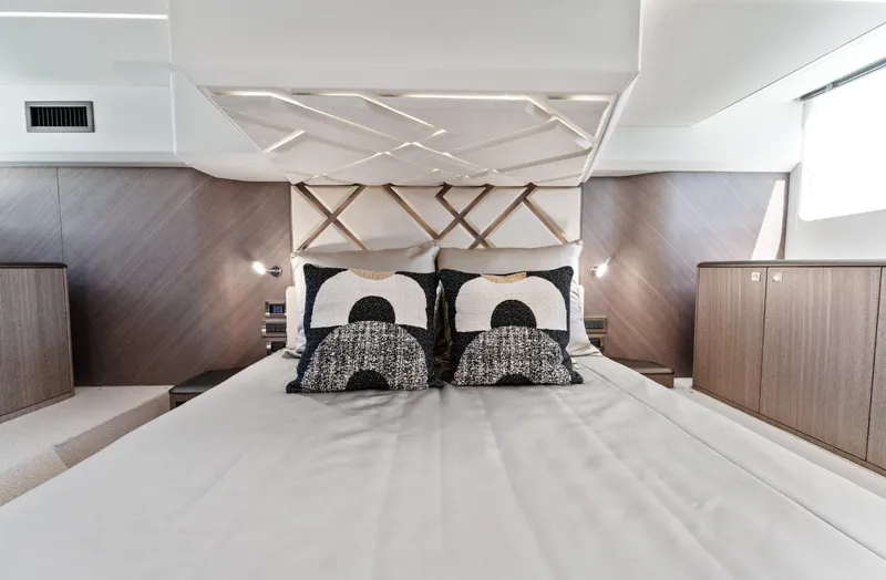  Yacht Photos Pics Luxurious bedroom interior of 2026 Galeon 440 Fly yacht with modern design elements.
