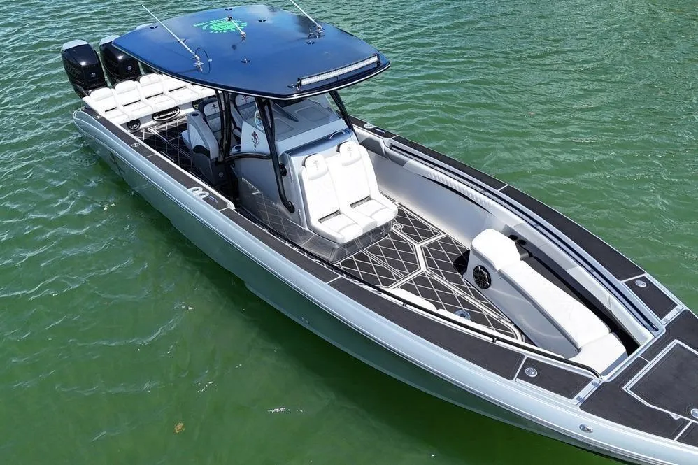 2016 Statement 380 Open boat on water, sleek design, spacious seating, modern features.