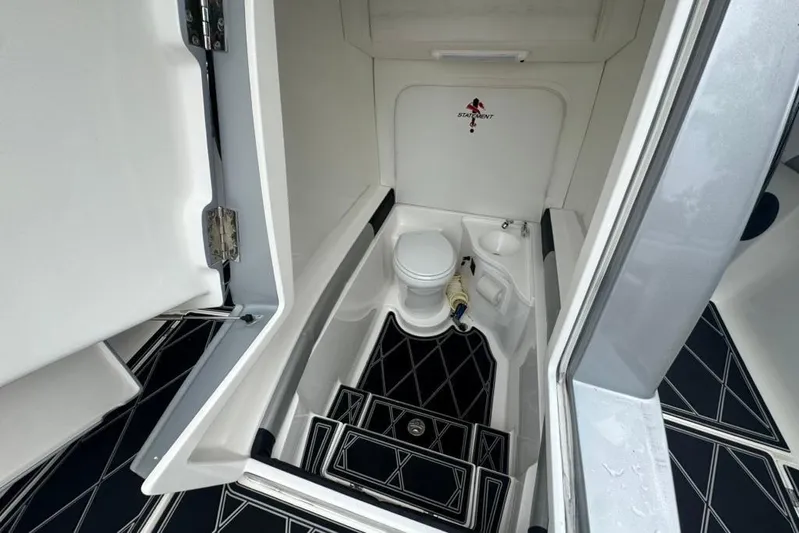  Yacht Photos Pics 2016 Statement 380 Open boat interior with compact bathroom and modern design.