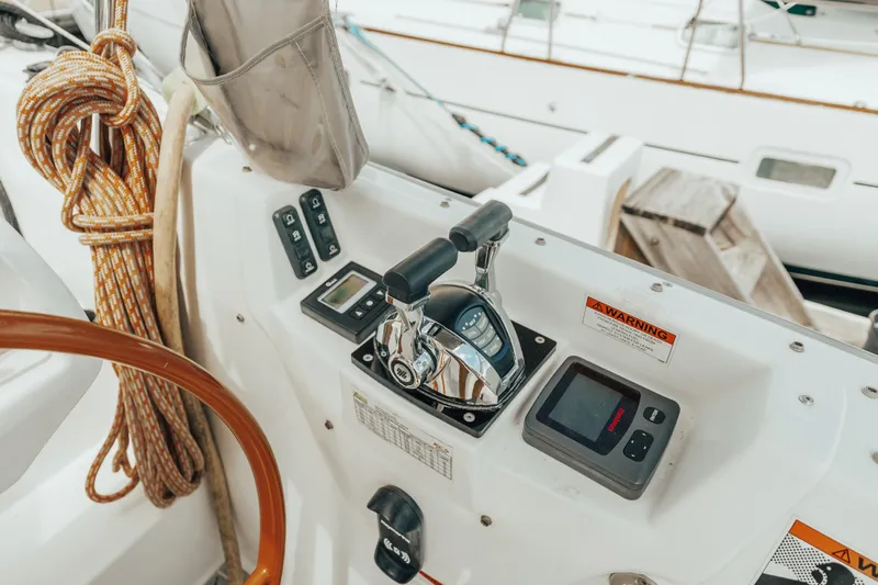 27 Reasons Yacht Photos Pics Control panel of a 2020 Excess 12 sailboat with ropes and navigation equipment.