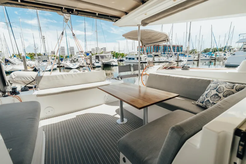 27 Reasons Yacht Photos Pics Luxurious 2020 Excess 12 yacht interior with marina view, featuring comfortable seating and elegant design.