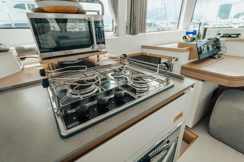 27 Reasons Yacht Photos Pics Modern kitchen in 2020 Excess 12 yacht with stove and microwave.