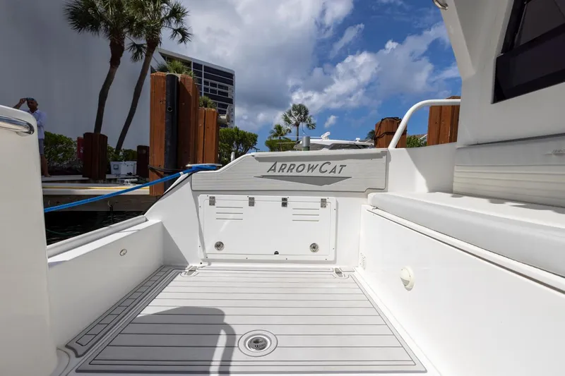 Transcendent Yacht Photos Pics 2023 ArrowCat Flybridge Dual Helm boat deck with sleek design and modern features.