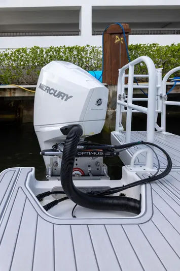 Transcendent Yacht Photos Pics 2023 ArrowCat Flybridge Dual Helm with Mercury outboard engine at dockside.