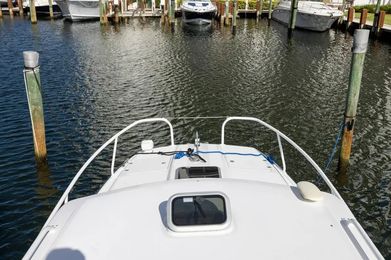 Transcendent Yacht Photos Pics 2023 ArrowCat Flybridge Dual Helm boat docked at marina, view from helm.