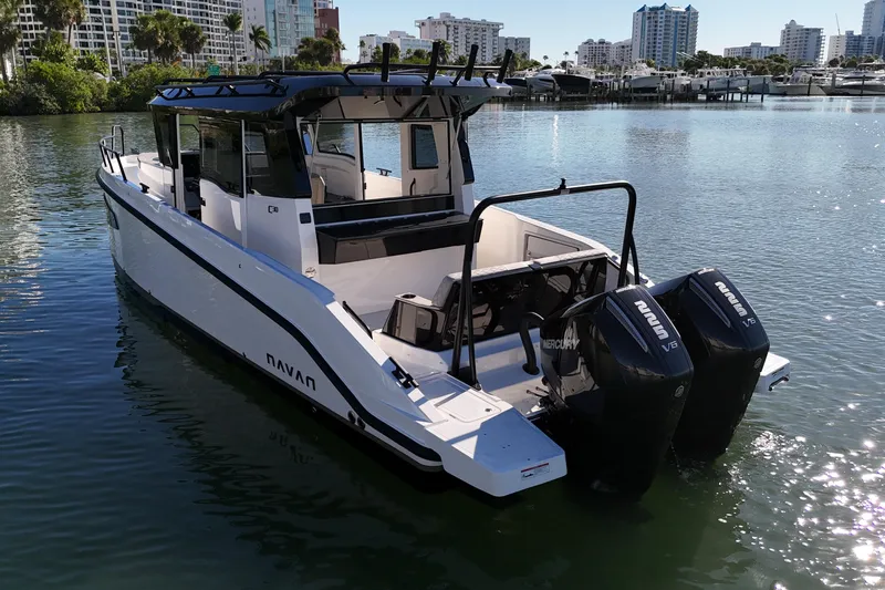  Yacht Photos Pics 2026 Navan C30 boat with dual Mercury engines on calm water.