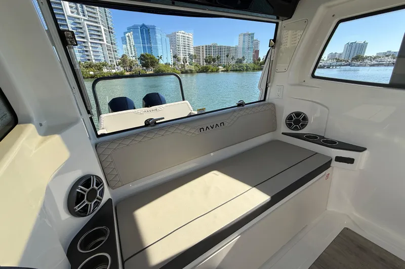  Yacht Photos Pics Interior of 2026 Navan C30 boat with seating and waterfront view.